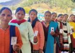 Women waiting to cast their votes.